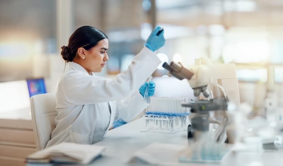 Woman in a lab running tests